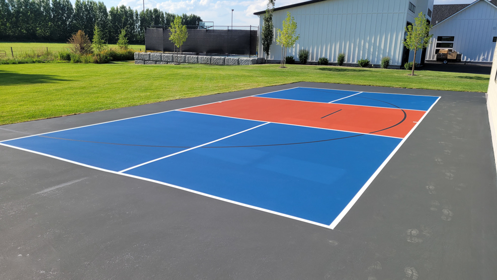 Residential surfacing for a pickleball and basketball court