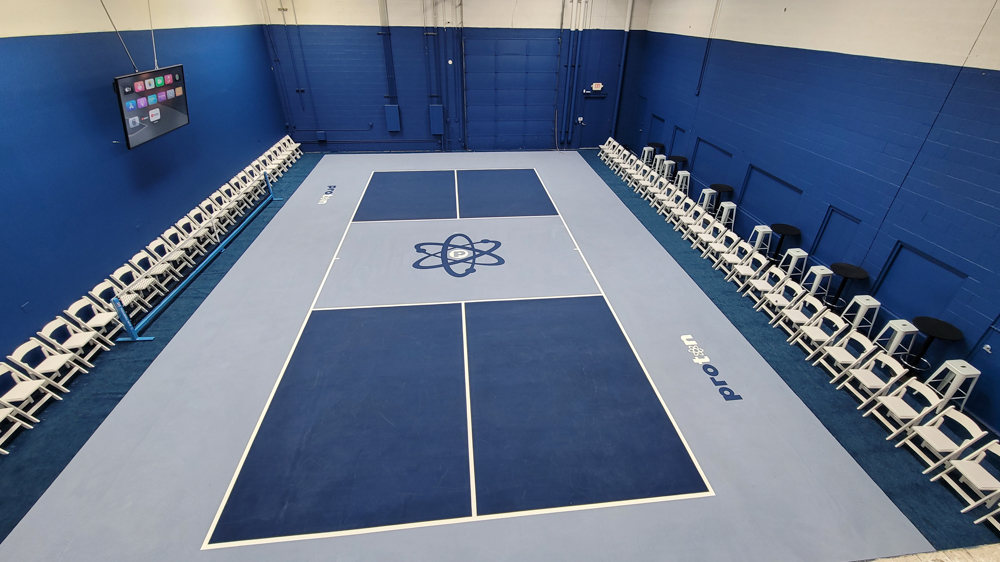 Indoor pickleball surfacing with a custom logo